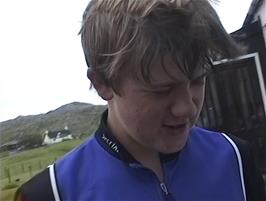 Gavin tells the story of his jellyfish sting for the camera at Achmelvich Youth Hostel